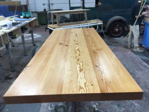 white pine floor joist table top with a clear finish